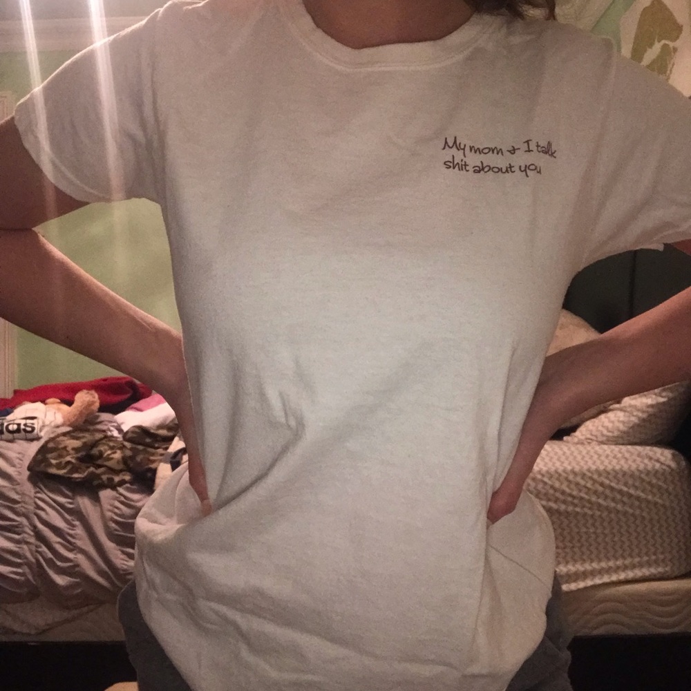 White graphic t: “my mom & I talk shit about you”